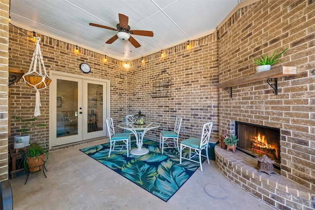 217 Golden Arrow Dr, Weatherford, TX 76087 - view of patio / terrace with an outdoor brick fireplace, french doors, and a ceiling fan