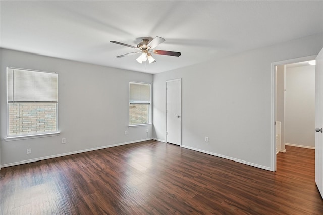 2712 Murphy Dr, Lancaster, TX 75134 - unfurnished room with a ceiling fan, plenty of natural light, and dark wood-type flooring