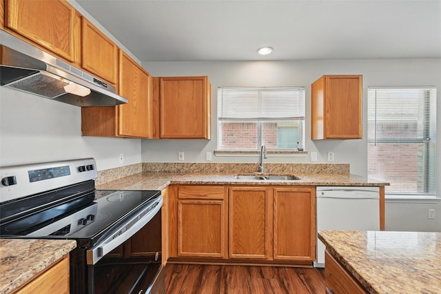 2712 Murphy Dr, Lancaster, TX 75134 - kitchen featuring stainless steel range with electric cooktop, a sink, dishwasher, under cabinet range hood, and dark wood-type flooring