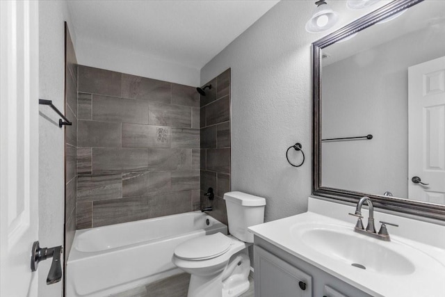 4204 Birch Creek Rd, Fort Worth, TX 76244 - full bathroom featuring toilet, a textured wall, vanity, and bathtub / shower combination