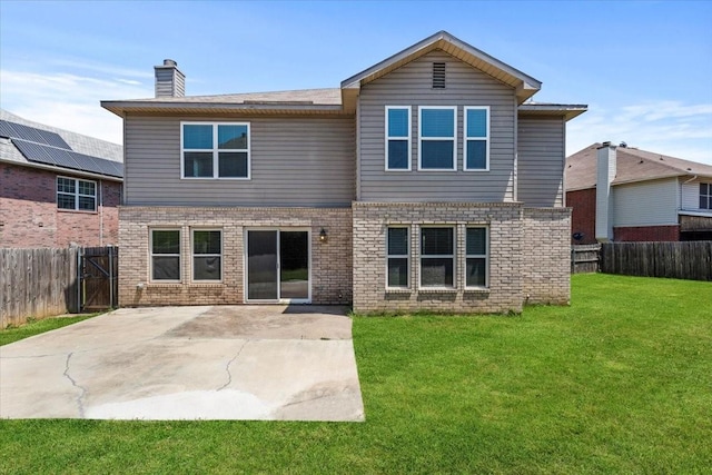 4204 Birch Creek Rd, Fort Worth, TX 76244 - rear view of house with a patio, brick siding, and a chimney