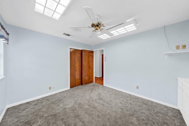 120 Wooded Crest Dr, Woodway, TX 76712 - unfurnished bedroom with carpet flooring, ceiling fan, and baseboards
