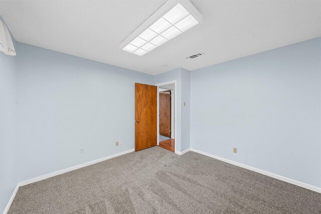 120 Wooded Crest Dr, Woodway, TX 76712 - empty room featuring carpet and baseboards