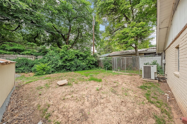 120 Wooded Crest Dr, Woodway, TX 76712 - fenced backyard featuring central AC
