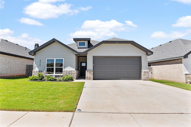 4518 Velta Ln, Abilene, TX 79606 - view of front of house featuring an attached garage, driveway, a front lawn, and roof with shingles