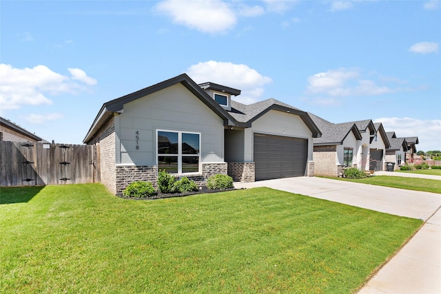 4518 Velta Ln, Abilene, TX 79606 - view of front of house with concrete driveway, an attached garage, brick siding, and a shingled roof