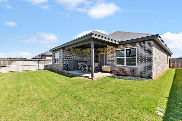 4518 Velta Ln, Abilene, TX 79606 - back of property featuring brick siding and a patio area
