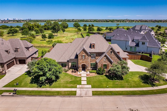 7305 Kingsbarns, The Colony, TX 75056 - aerial perspective of suburban area featuring a large body of water