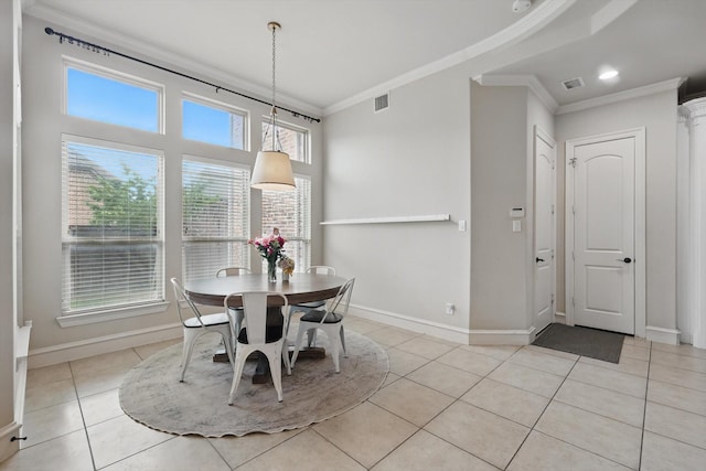 4219 Bal Harbour Ln, Frisco, TX 75033 - dining space featuring ornamental molding, baseboards, and light tile patterned flooring