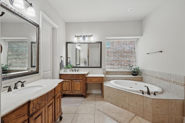 4219 Bal Harbour Ln, Frisco, TX 75033 - bathroom featuring tile patterned floors, two vanities, and a tub with jets