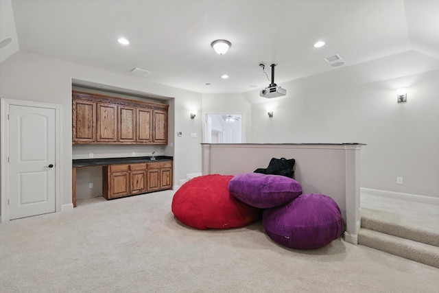 4219 Bal Harbour Ln, Frisco, TX 75033 - bar featuring light colored carpet, baseboards, recessed lighting, vaulted ceiling, and a sink