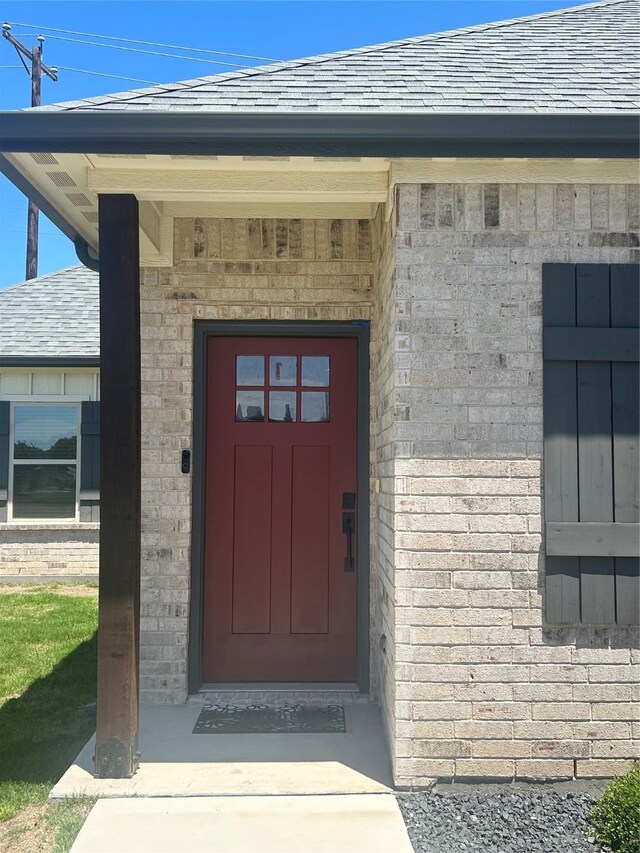 140 Hummingbird Dr, Weatherford, TX 76088 - property entrance featuring a shingled roof