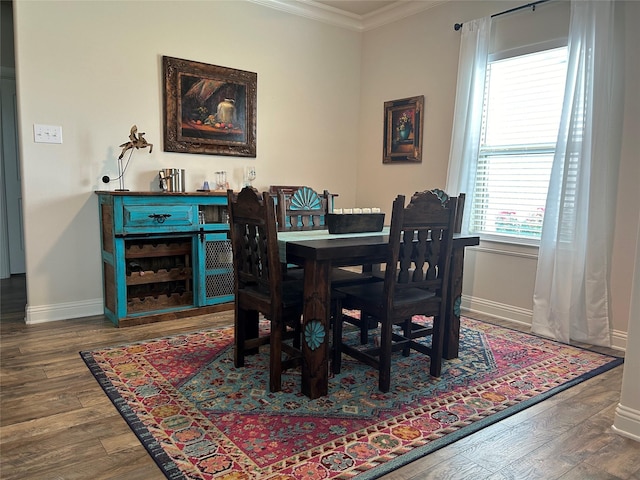 140 Hummingbird Dr, Weatherford, TX 76088 - dining room featuring ornamental molding, baseboards, and wood finished floors
