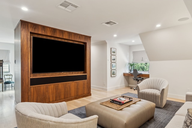 3645 Reagan St, Dallas, TX 75219 - living area with baseboards, light wood-style floors, and recessed lighting