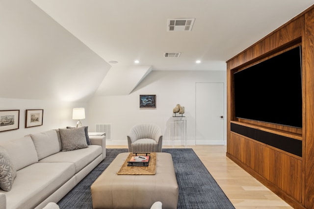 3645 Reagan St, Dallas, TX 75219 - living room featuring light wood finished floors, recessed lighting, lofted ceiling, and baseboards