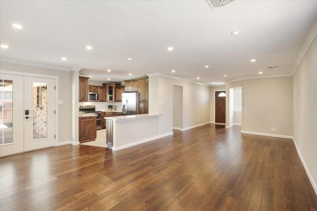 131 S Imperial Dr, Denison, TX 75020 - unfurnished living room featuring recessed lighting, french doors, dark wood-style flooring, crown molding, and baseboards