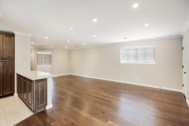 131 S Imperial Dr, Denison, TX 75020 - unfurnished room with light wood-type flooring, crown molding, recessed lighting, and baseboards