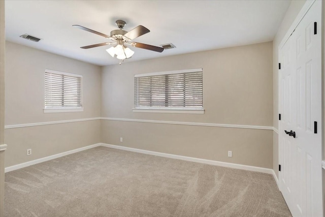 131 S Imperial Dr, Denison, TX 75020 - spare room featuring carpet flooring, a ceiling fan, and baseboards
