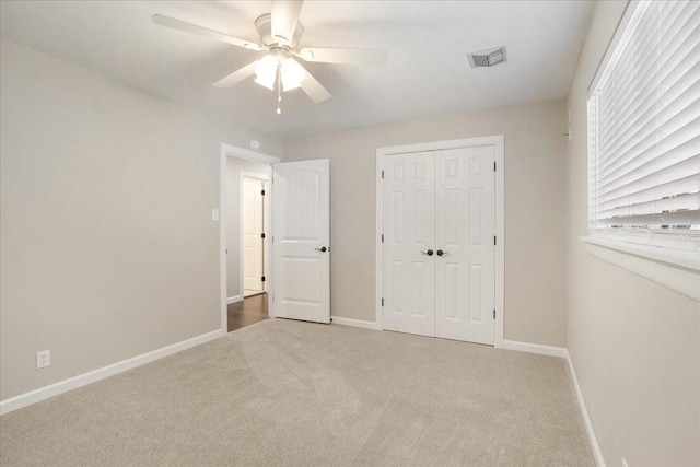 131 S Imperial Dr, Denison, TX 75020 - unfurnished bedroom featuring carpet floors, baseboards, and a closet