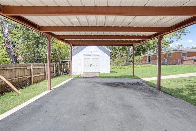 131 S Imperial Dr, Denison, TX 75020 - view of car parking featuring a shed