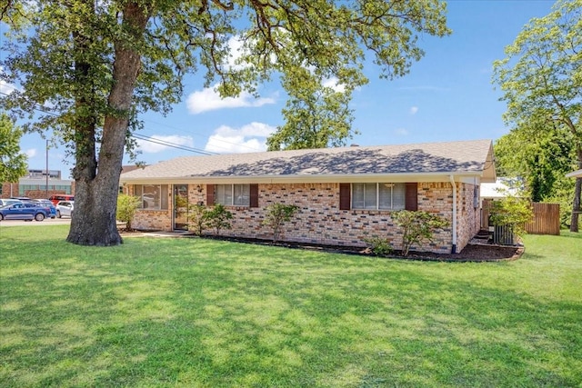 131 S Imperial Dr, Denison, TX 75020 - single story home featuring brick siding and a shingled roof