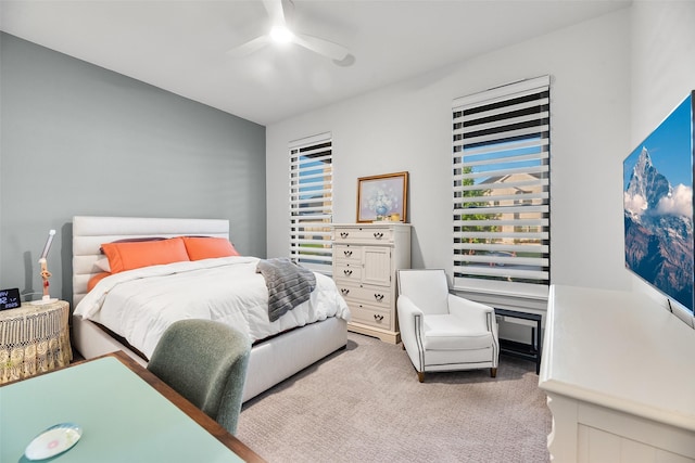 1907 Cedar Bluff Pkwy, Mansfield, TX 76063 - bedroom featuring light colored carpet, multiple windows, and ceiling fan