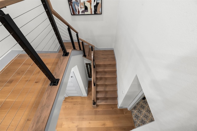 1907 Cedar Bluff Pkwy, Mansfield, TX 76063 - stairs featuring wood finished floors and baseboards