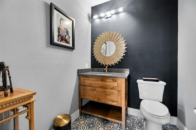 1907 Cedar Bluff Pkwy, Mansfield, TX 76063 - half bathroom with vanity, toilet, and baseboards