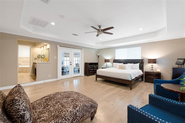 635 E Tripp Rd, Sunnyvale, TX 75182 - bedroom with a raised ceiling, french doors, light wood-style floors, and recessed lighting
