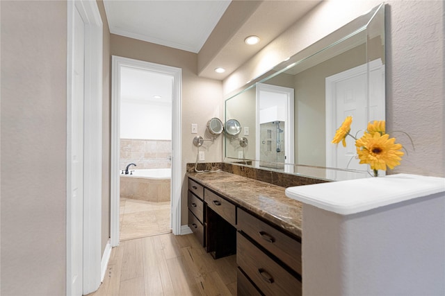 635 E Tripp Rd, Sunnyvale, TX 75182 - full bathroom featuring crown molding, a bath, vanity, and recessed lighting