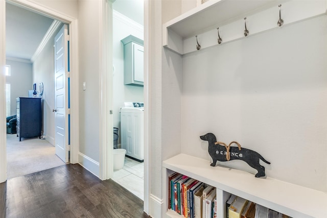 4008 N Cresthaven Rd, Dallas, TX 75209 - mudroom featuring washer / dryer, crown molding, dark wood-style flooring, and baseboards