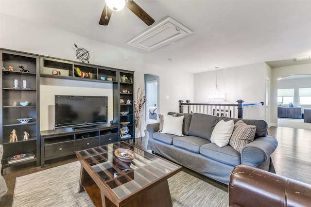 4008 N Cresthaven Rd, Dallas, TX 75209 - living room with arched walkways, attic access, a ceiling fan, and wood finished floors