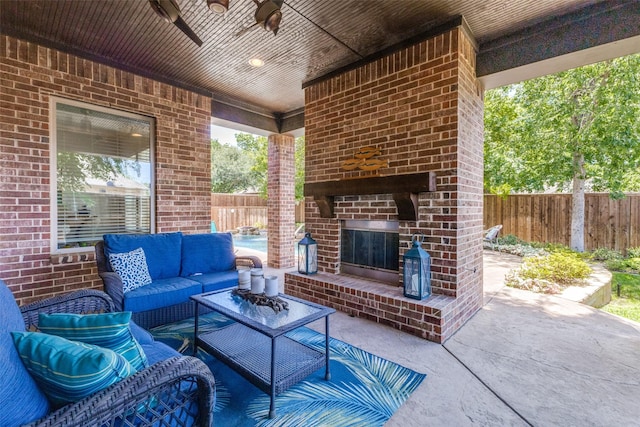 4008 N Cresthaven Rd, Dallas, TX 75209 - fenced backyard featuring a patio and an outdoor living space with a fireplace