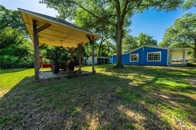 208 Lynn Creek Cv, Mabank, TX 75156 - view of green lawn with a patio area
