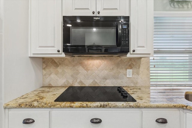 160 Brandy Hill Rd, Lorena, TX 76655 - kitchen with black appliances, white cabinets, decorative backsplash, and light stone counters