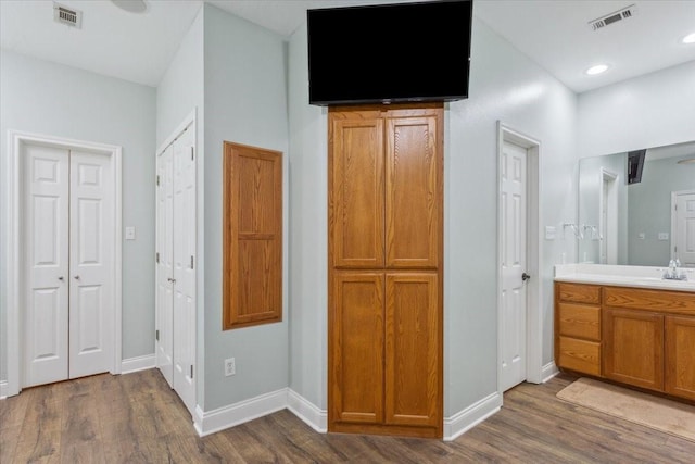 160 Brandy Hill Rd, Lorena, TX 76655 - bathroom featuring a closet, vanity, wood finished floors, and baseboards