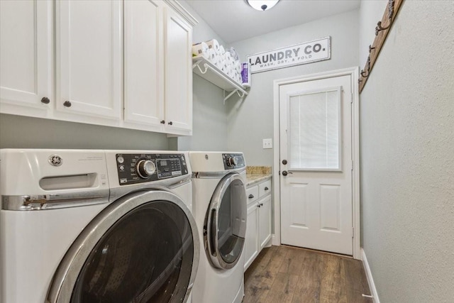 160 Brandy Hill Rd, Lorena, TX 76655 - laundry area featuring washing machine and clothes dryer, dark wood-style flooring, cabinet space, and baseboards