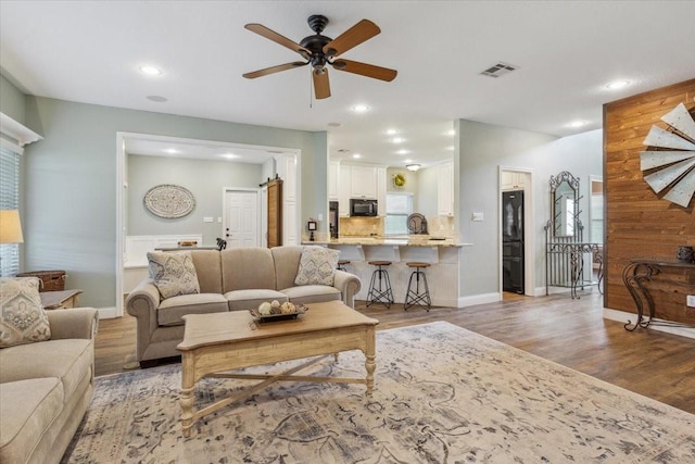 160 Brandy Hill Rd, Lorena, TX 76655 - living area featuring ceiling fan, recessed lighting, light wood-style flooring, and baseboards