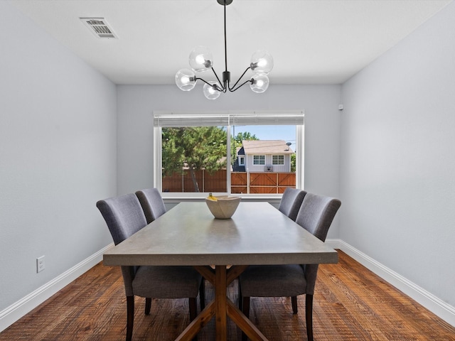 7724 Meadowhaven Dr, Dallas, TX 75254 - dining area featuring baseboards, a chandelier, and wood finished floors