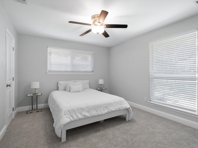 7724 Meadowhaven Dr, Dallas, TX 75254 - carpeted bedroom featuring baseboards and ceiling fan
