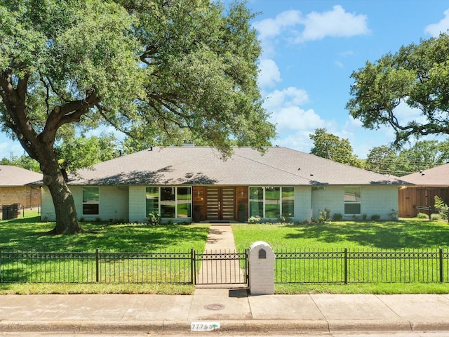 7724 Meadowhaven Dr, Dallas, TX 75254 - view of front of house with brick siding and a gate