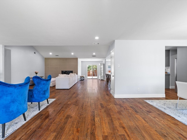 7724 Meadowhaven Dr, Dallas, TX 75254 - living room featuring dark wood-type flooring, a fireplace, baseboards, and recessed lighting