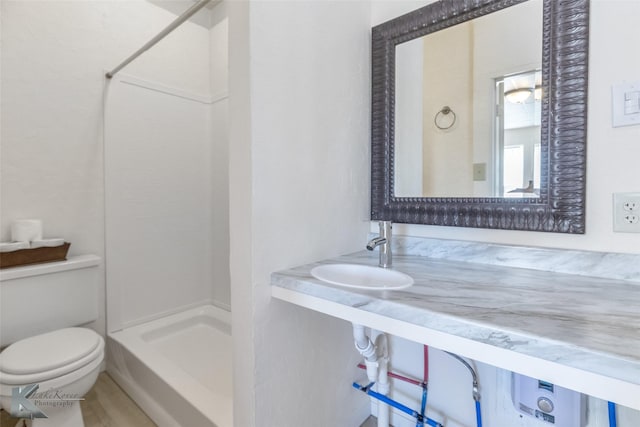 240 5th St, Hawley, TX 79525 - bathroom with a shower, toilet, and vanity