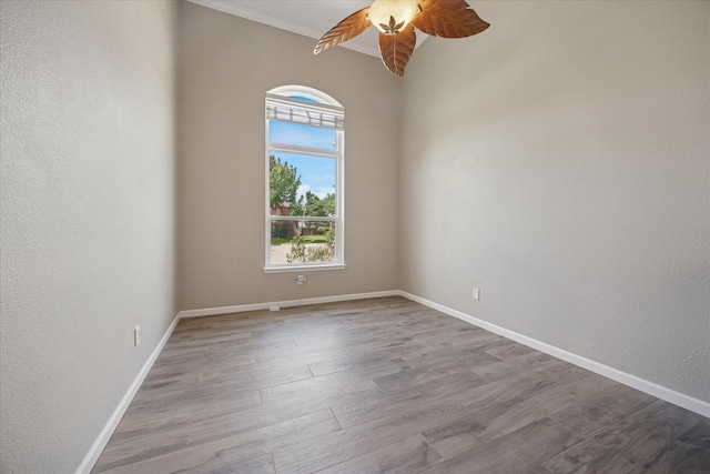 8408 Island Ct, Fort Worth, TX 76137 - unfurnished room with a ceiling fan, wood finished floors, baseboards, and a textured wall