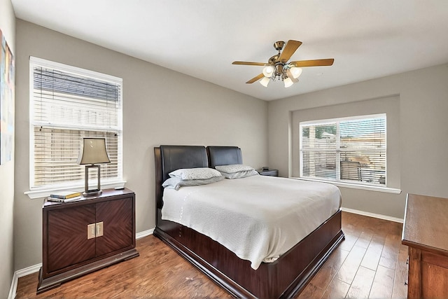 4533 Crooked Ridge Dr, The Colony, TX 75056 - bedroom with wood finished floors, baseboards, and ceiling fan