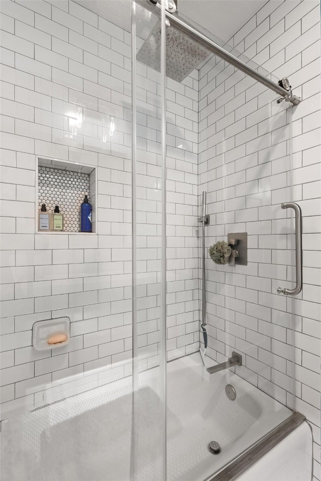 2708 Hunters Creek Dr, Plano, TX 75075 - bathroom featuring shower / bath combination with glass door