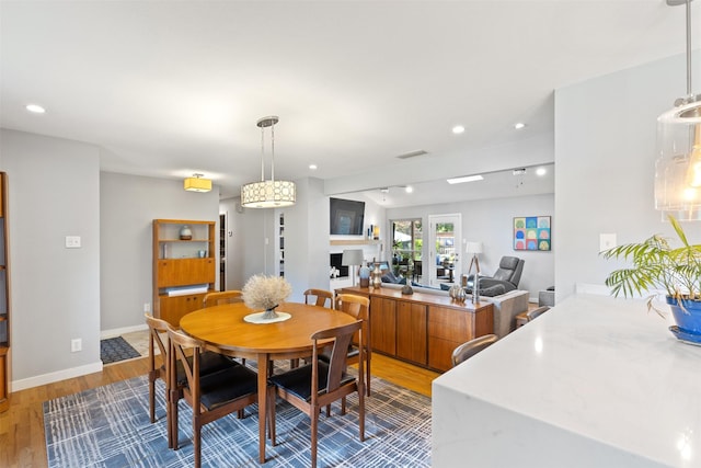 2708 Hunters Creek Dr, Plano, TX 75075 - dining space with wood finished floors, recessed lighting, and baseboards