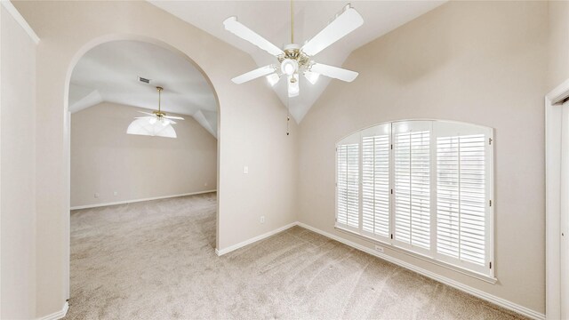 2700 Lake Crest Dr, Flower Mound, TX 75022 - carpeted spare room with lofted ceiling, a ceiling fan, and baseboards