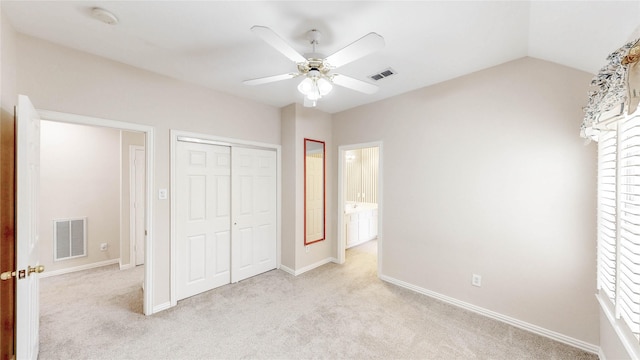 2700 Lake Crest Dr, Flower Mound, TX 75022 - unfurnished bedroom with light carpet, a closet, a ceiling fan, baseboards, and lofted ceiling
