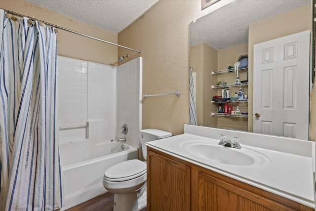 2200 Lookout Ln, Denton, TX 76207 - bathroom with a textured ceiling, a textured wall, toilet, shower / bath combo with shower curtain, and vanity